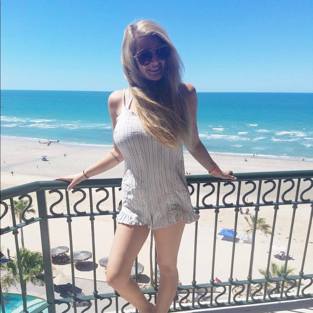 Light blue and white romper